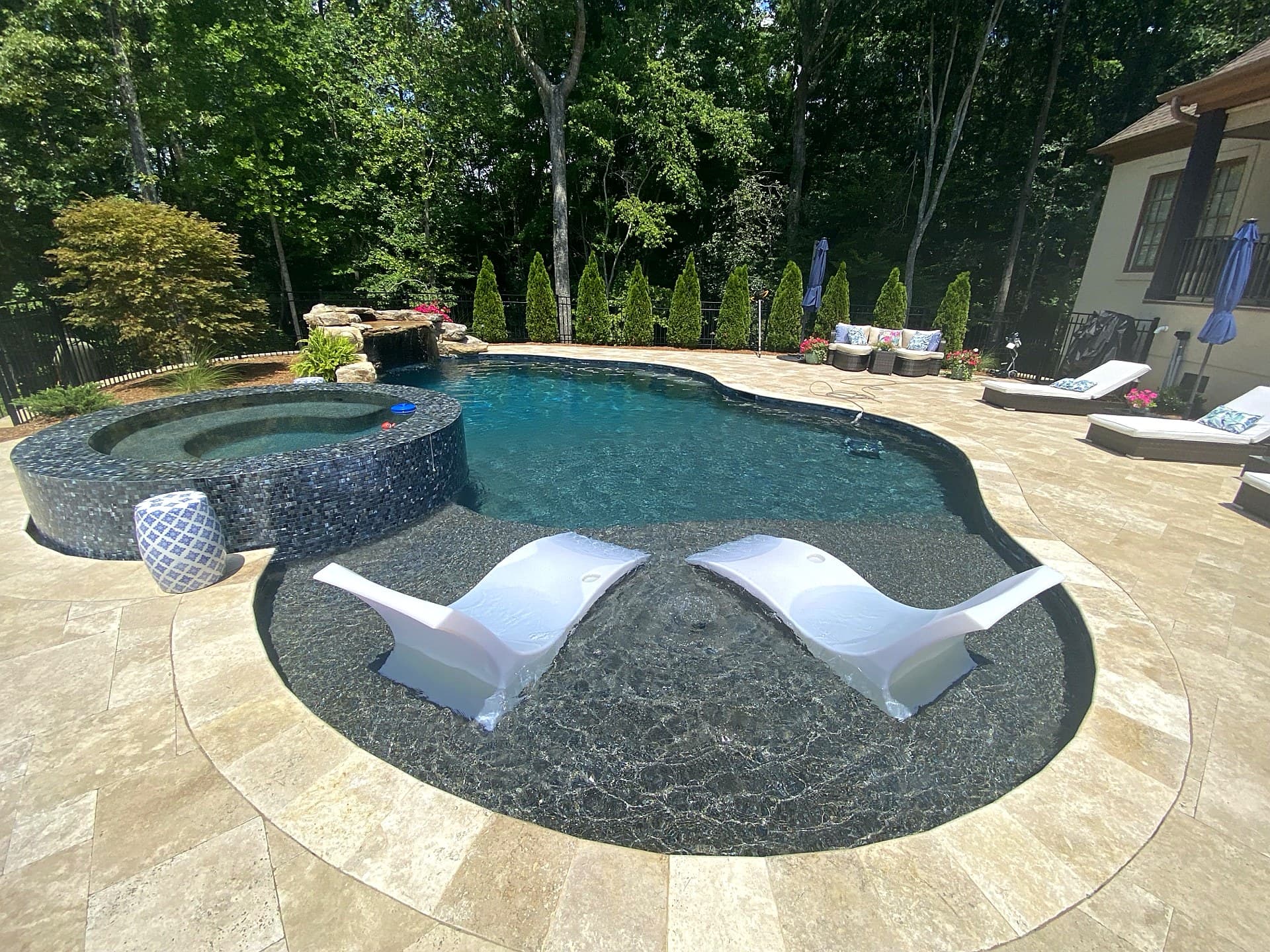 Luxury pool with tanning ledge and waterfall - financed through Lyon Financial